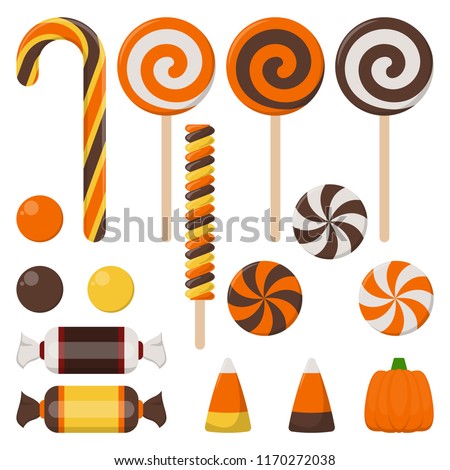 Assortment of Colorful Halloween Candy - Halloween candy including candy cane, lollipop, gum ball, wrapped candy, and more isolated on white background