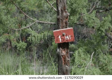 1-mile sign on a hiking path