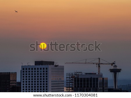Red sunset over Seattle during forest fires 