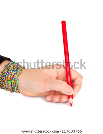 Red pencil in hand isolated on white background