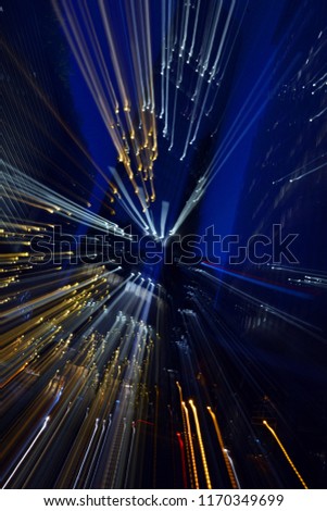 scattered lines of light against the background of skyscrapers