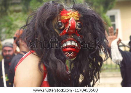 One of the characters in the performance of Reog Ponorogo folk art.