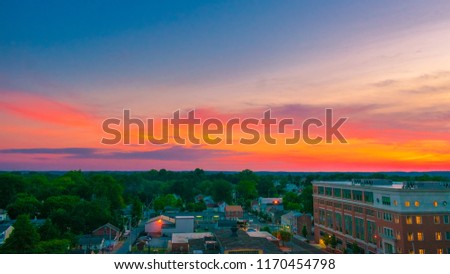 Aerial view of suburban houses and colorful sunset sky - West Chester, Pennsylvania, USA Royalty-Free Stock Photo #1170454798