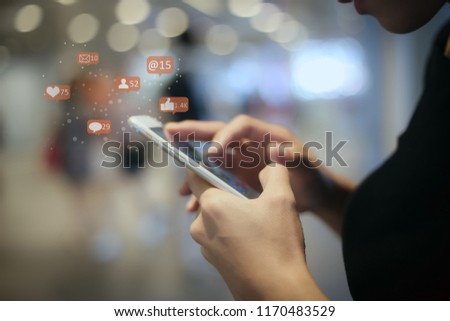 woman or Lady
 using mobile smart phone at night
