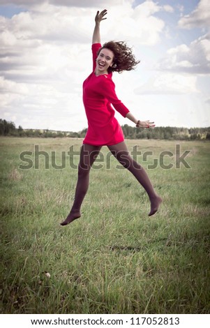 Girl walking in the field