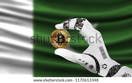 crypto currency bitcoin in the robot hand, the concept of artificial intelligence