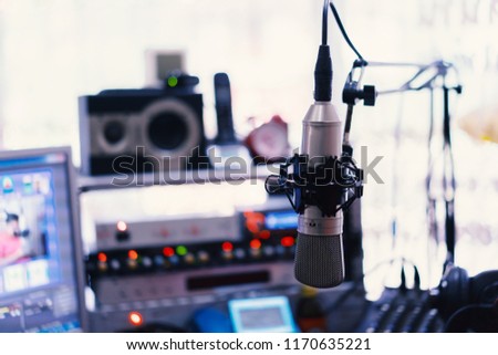 audio Microphone in a record studio or concert hall ,above recording in radio studios mixer sound mixing mic console board,selective focus,vintage color