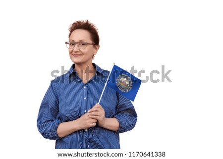 New Hampshire flag. Woman holding New Hampshire state flag. Nice portrait of middle aged lady 40 50 years old with a state flag isolated on white background.