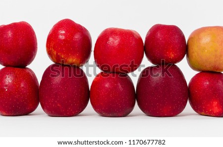 Many red apples on white background