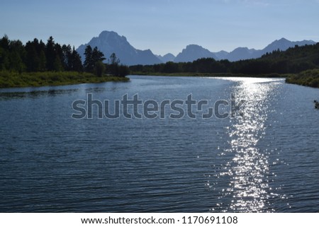 Late afternoon light  reflected on waters in Teton National park