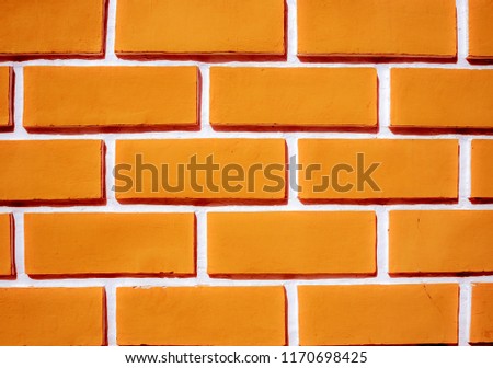 Weathered texture of stained old dark aging brick wall background, grungy rusty blocks of stone-work technology, horizontal architecture. industry building construction  with copy sace