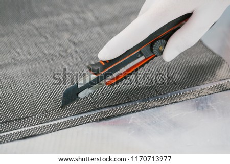 Cutting Raw Carbon fiber composite material with plastic utility knife