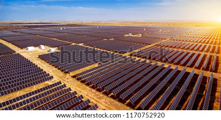 Aerial photography of large-area solar photovoltaic panels outdoors Royalty-Free Stock Photo #1170752920