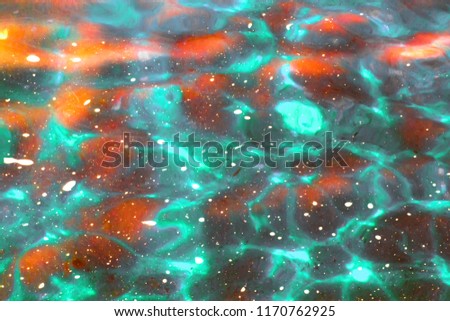 Abstract blue sea water with white foam in the sun bloody sunset for the background, concept nature background
