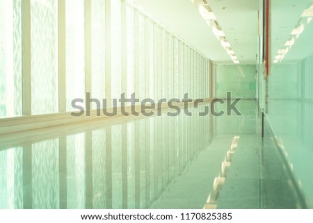 walkway of the office building, big square mirror modern building,