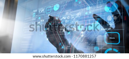 Financial report data of business operations (balance sheet and income statement and diagram) as Fintech concept.businessman hand working with modern technology and digital layer effect as business Royalty-Free Stock Photo #1170881257