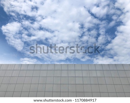 concrete wall with blue sky background