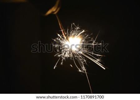 Sparkler in summer Royalty-Free Stock Photo #1170891700