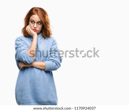Young beautiful woman over isolated background wearing winter sweater thinking looking tired and bored with depression problems with crossed arms.