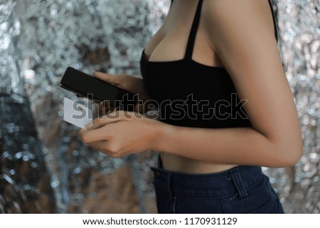 Online payment,Man and Woman  hands holding a credit card and using smart phone laptop  for online shopping