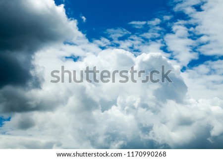 Blue sky with white clouds.
