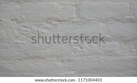 Painted brick wall cream exterior paint