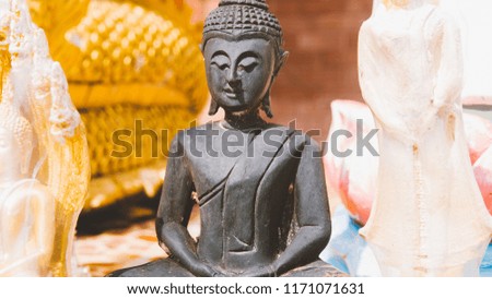 old holy Buddha statue close-up. Thailand religion in details
