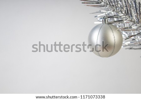 Christmas composition of fir branches and Christmas balls of viburnum on a white background isolated