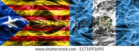 Catalonia vs Guatemala copy smoke flags placed side by side. Thick colored silky smoke flags of Catalan and Guatemala copy