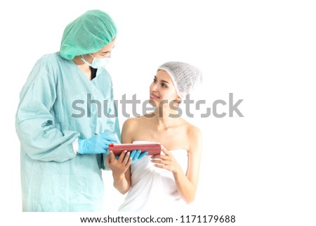 Doctor with Patient consultation or Discussing Records which surgeon using digital tablet in operation ,healthy beauty concept