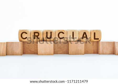 Crucial word on wooden cubes