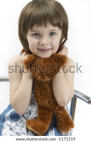 portrait of young girl with a teddy