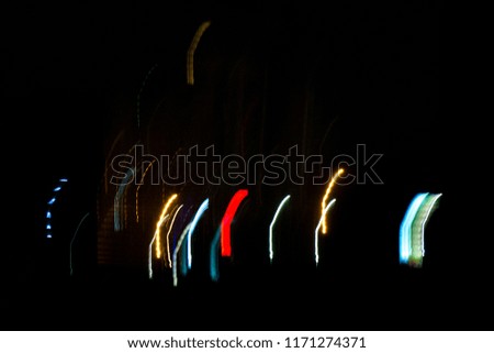 Night City Lights Concept: Abstract Blurred Defocused Background Of City Lights Glowing At Night
