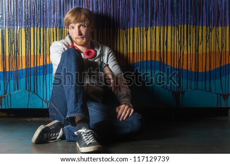 Portrait of young man in cool location