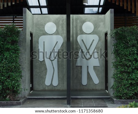 Man and lady toilet sign.