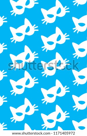 white paper cat mask pattern on blue background. Halloween, carnival, masquerade concept. Vertical