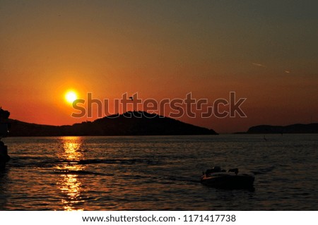 the view of sunset sky above the islands
