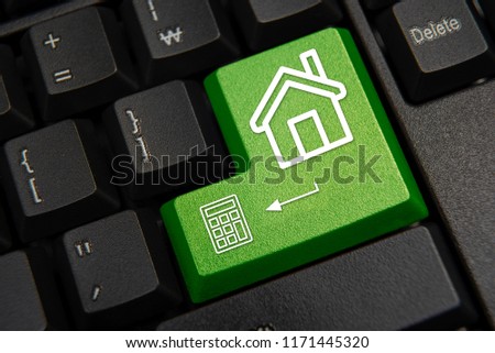 Black computer keyboard close-up. Real Estate Marketing Concept.