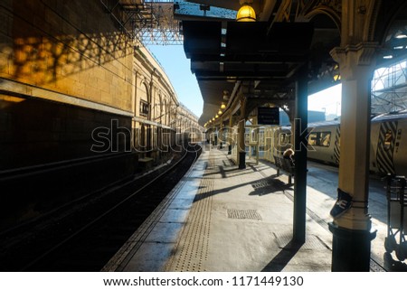 A picture of a railway station during morning with in Weaverly Station, Edinburgh.
