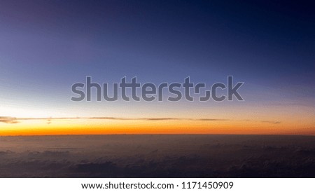 A very simple and clean background image taken from an aircraft window. The sky is vivid and colorful. This is good for background or wallpaper use.