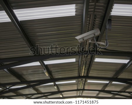 CCTV, security camera system operating at the parking lot in the mall protection security