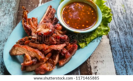 Picture for thai food catalogs menu , Charcoal-boiled pork neck or Northeastern Thai style grilled pork with spicy dipping sauce