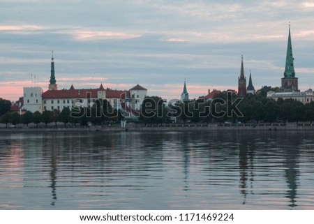 Panorama of medieval part of Riga. Latvia. The image is made before dawn. Low key.