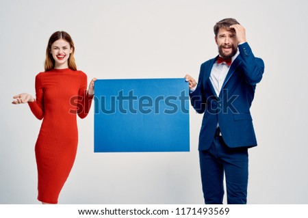 show business Business people with a poster in hand                      