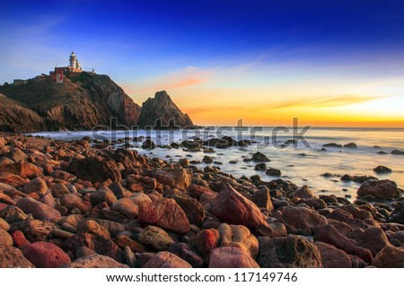 Sunset on the coast of the natural park of Cabo de Gata Royalty-Free Stock Photo #117149746