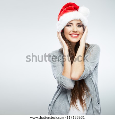 Christmas Santa hat isolated woman portrait . Smiling happy girl on white background.