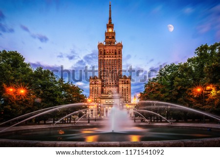 Warsaw and View of Palace of Culture and sciences (one of the main travel attractions - The Main symbol of Warsaw) with Fountain Close Up  Royalty-Free Stock Photo #1171541092