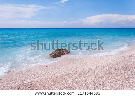 Beautiful sea waves on the beach on sunny summer day, Lefkada island, Greece
