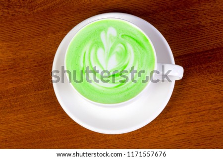 Hot Green cappuccino with cream