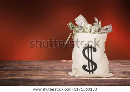 Money Bag with money on   background.